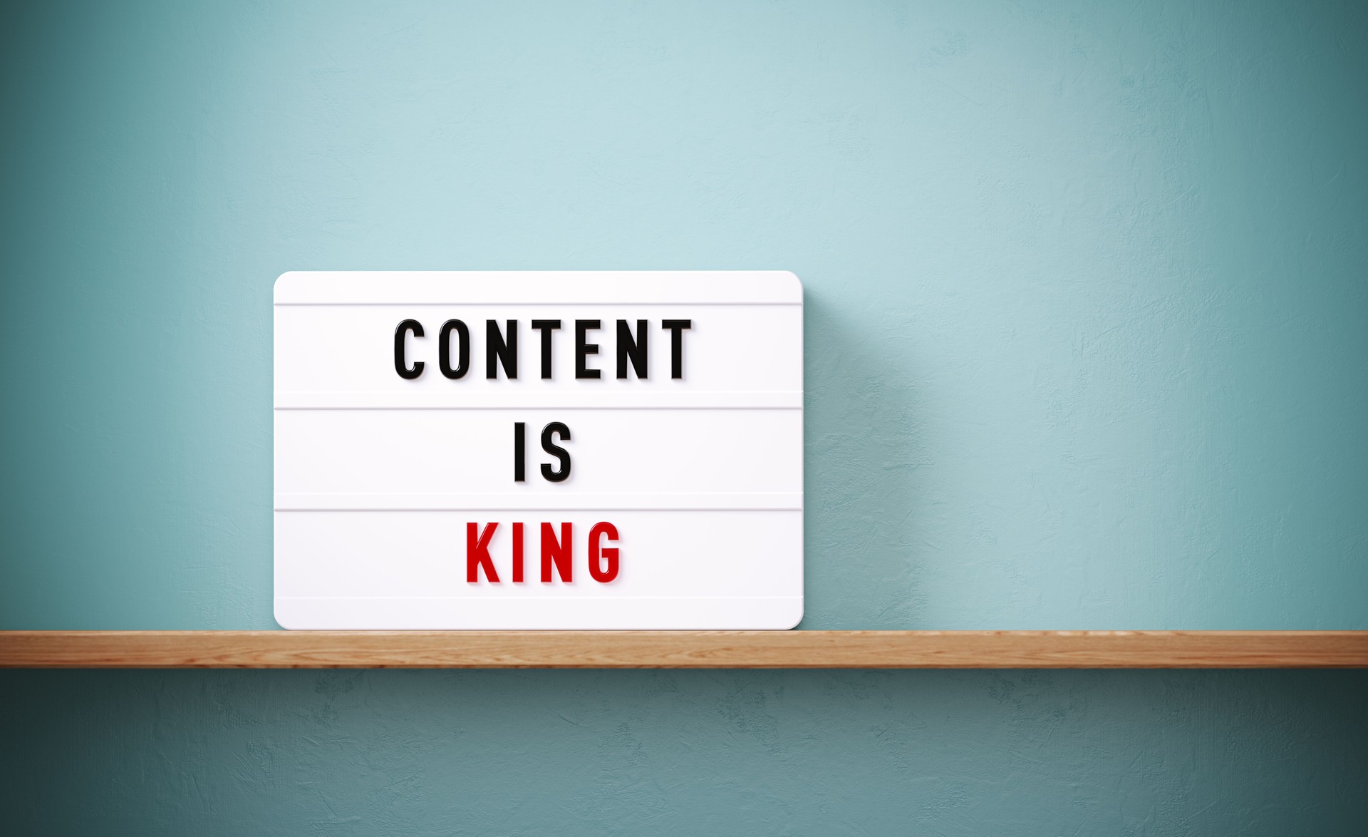 Content Is King Written White Lightbox Before Gray Wall